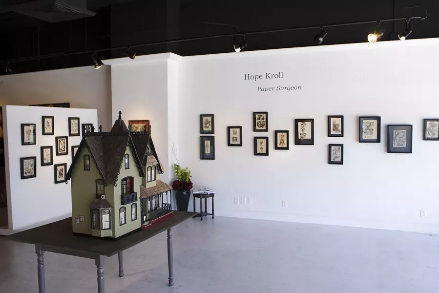 PAPER SURGEON : One of the most intricate pieces in Hope Kroll’s exhibit at Vale Fine Art (pictured) is a fully furnished dollhouse that took the artist 10 years to complete.