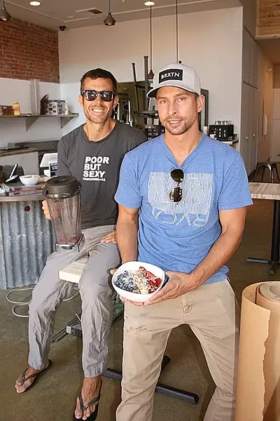 BOWL BROS: Bowl’d owners James Whitaker (left) and Chris Tarcon aim to bring tasty, health-conscious açaí bowls, smoothies, and kombucha to downtown. - PHOTO BY HAYLEY THOMAS