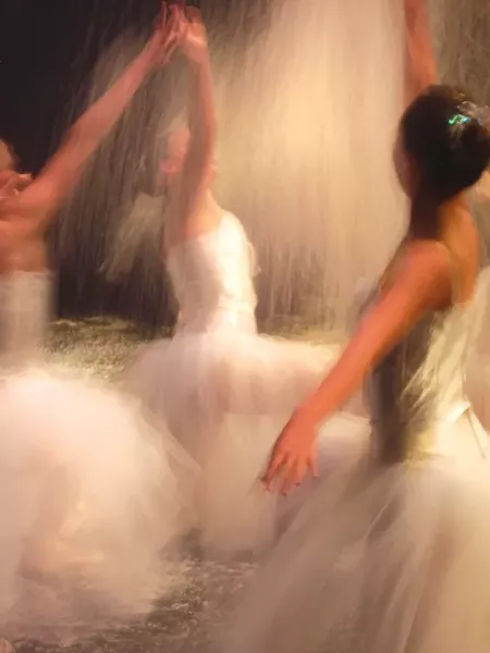 SPINNING DANCERS: - PHOTO BY CRAIG SHAFER