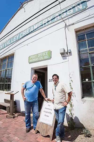 DAIRY LIFE: Third-generation dairy farmer and Harmony Valley Creamery owner Alan Vander Horst (left) aims to restore and refresh Harmony’s historic creamery building with a restaurant serving up Swiss-Italian grub and a creamery shop featuring fresh cheese curds, milk, butter, semi-soft cheeses, and ice cream. Project manager Tom Halen (right) provides the hospitality know-how. - PHOTO BY KAORI FUNAHASHI