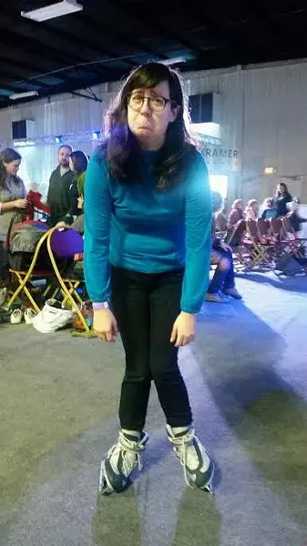 BLADES OF SHAME: This is photographic evidence of the one second I was able to stand up on my own with skates on. Nailed it! - PHOTO BY CAT SENET