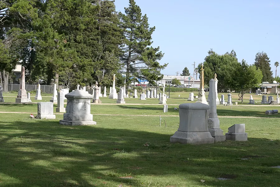 TOO LATE : By the time I left the pool, the American flags decorating the cemetery had been removed - PHOTO BY GLEN STARKEY