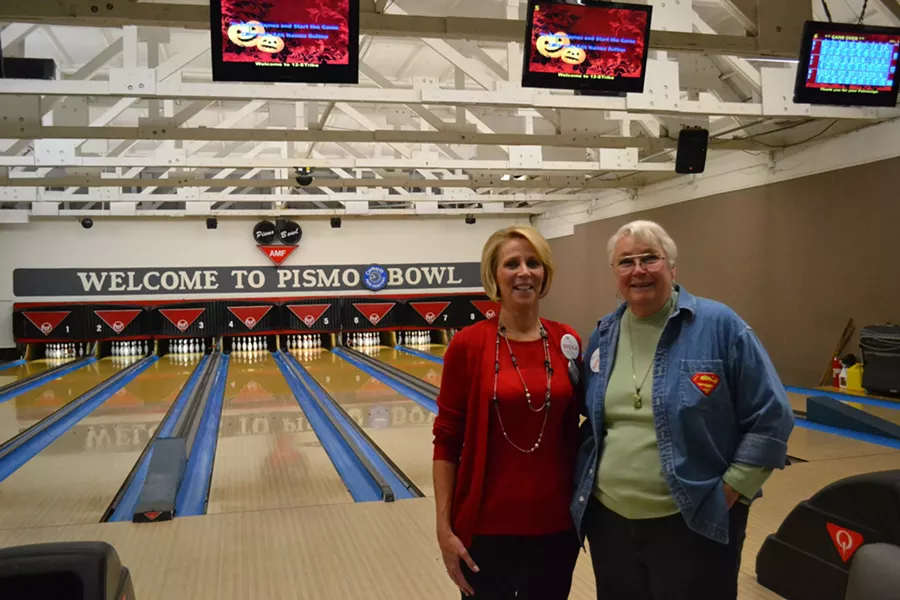 TWO FOR PRICE CANYON: Pismo Beach City Council candidates Marcia Guthrie (left) and Sheila Blake (right) gathered on the night of Nov. 4 to bowl a few frames and track the election returns. - PHOTO BY RHYS HEYDEN