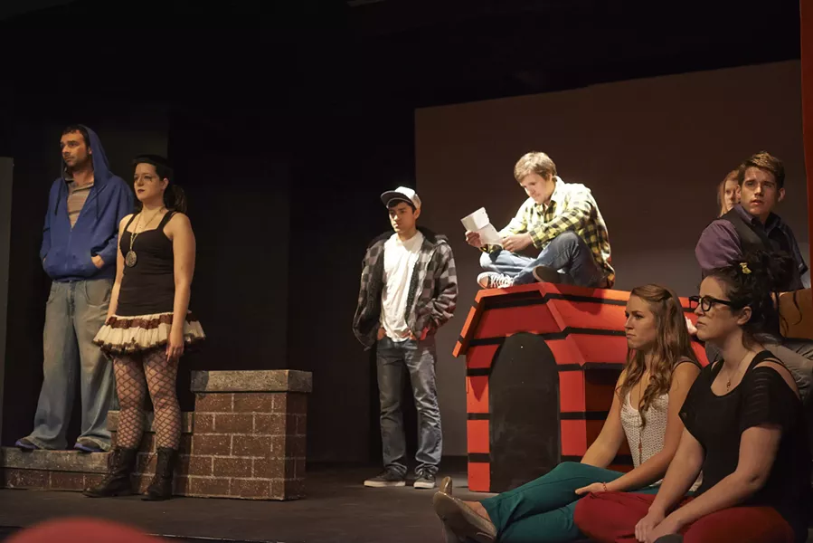 WHAT A BLOCKHEAD! : After the death of his beloved beagle, CB (Steven Freitas, on the doghouse) goes on a quest for the answers to life’s biggest questions, in Dog Sees God. Also pictured, from left to right, are Van (Jared Dawson), CB’s sister (Kat Endsley), Matt (Nicholis Sheley), Beethoven (Von Lewis, at the piano), Van’s sister (Ellen Jones, behind Beethoven’s head), and Tricia and Marcy (Marnie Knight and Ashley Moses, on the floor). - PHOTOS BY STEVE E. MILLER