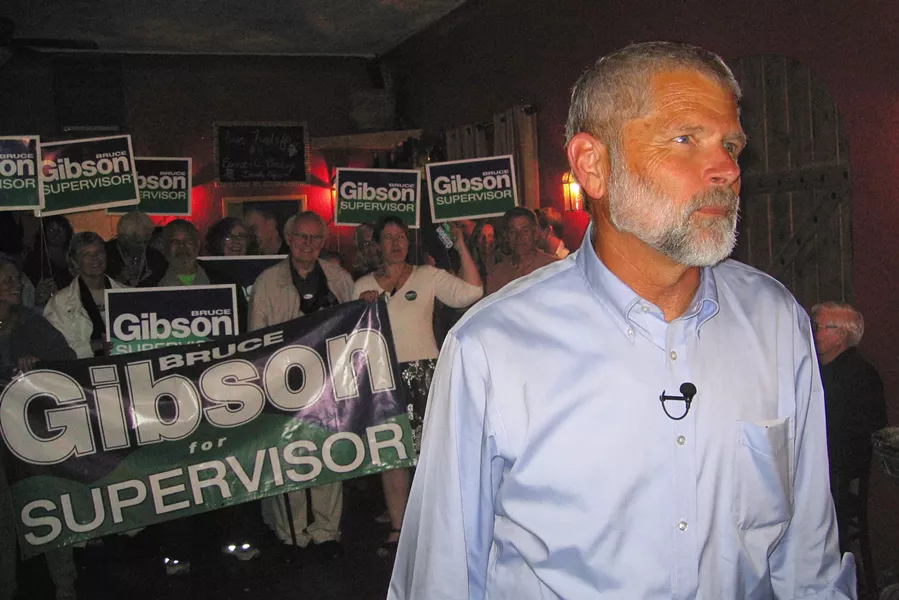 BIG WINNER : County Supervisor Bruce Gibson, his supporters gathered behind him, prepares for the TV cameras at his election-night victory party at Café Della Via in Cayucos. - PHOTO BY KATHY JOHNSTON