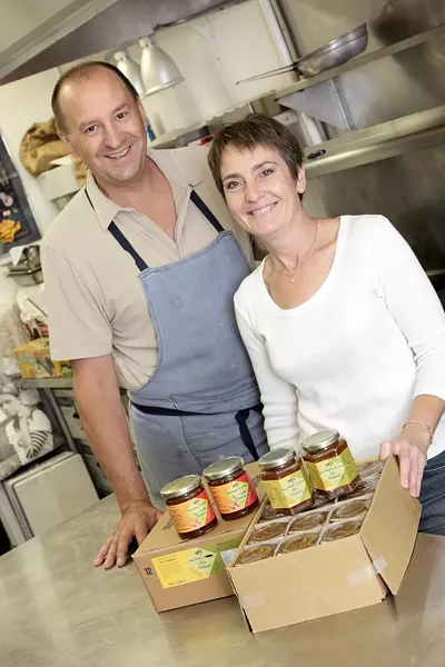 HAPPY WITH GOOD REASON : Claude Chazalon and his wife Chrystel produce some of the most delectable treats to be found in jars. - PHOTO BY STEVE E. MILLER