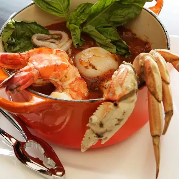 A RICH LUNCH : Cioppino brimming with seafood is now available for lunch on Mondays at Ciopino. - PHOTO BY STEVE E. MILLER