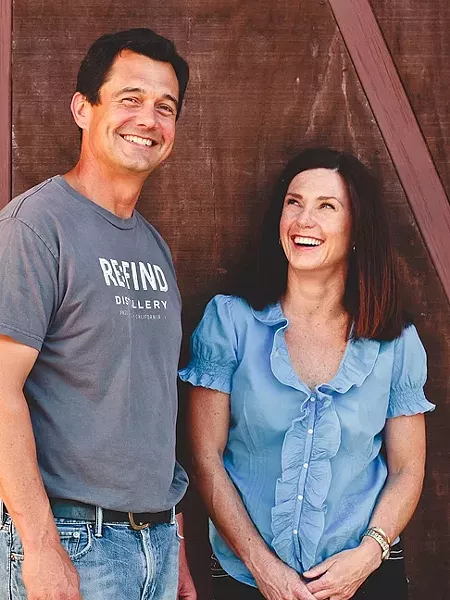 DISTILLERS OF SLO: Alex Villicana (left) serves as the president of Distillers of SLO County, the nonprofit trade association uniting SLO’s growing craft spirit industry. Alex and Monica Villicana (right) operate Re:Find Distillery in Paso Robles. - PHOTO COURTESY OF RE:FIND DISTILLERY