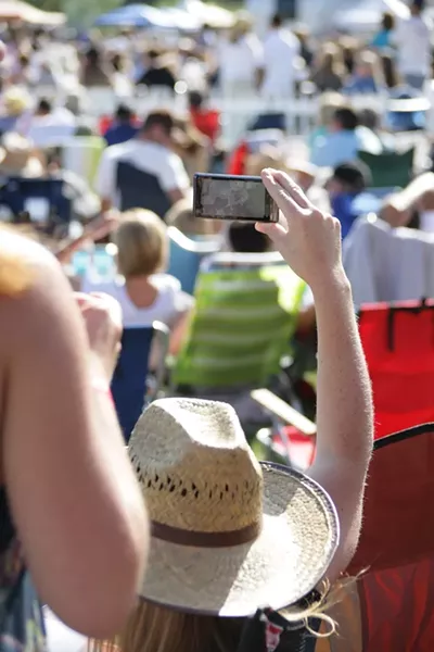 CELL PHONES ARE THE NEW LIGHTERS : There’s nothing like a lo-fi, shaky, cell phone video to remind you of the fun you had! - PHOTO BY GLEN STARKEY