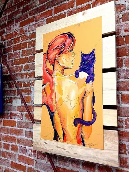 CAT LADY: Sara LeGrady's vibrant paintings adorned the walls of Tigerlily Salon as part of SLO's Art After Dark. - PHOTO BY JESSICA PEÑA