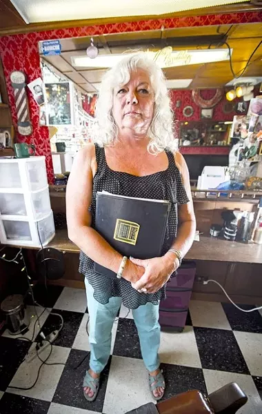 PERFECT STORM OF CRAP: For Diane Gillett, a slumping economy and dual knee surgeries led to a long sequence of battles with her creditors that ultimately resulted in a lawsuit brought against her. - PHOTO BY HENRY BRUINGTON