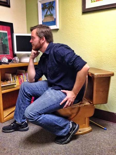 DEEP THUNKER: This is Nick Powell, sitting on the office toilet. He wanted to write something about a poop joke here. - PHOTO BY STEVE E. MILLER