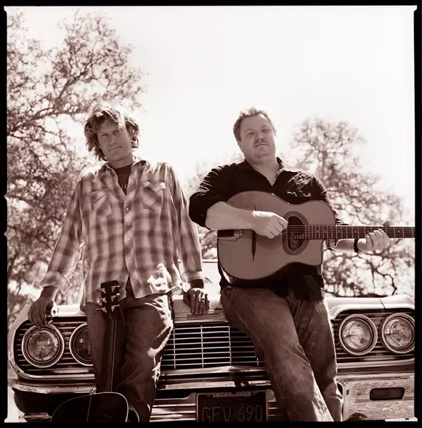 GOOD COUNTRY BOYS : Templeton resident Mark Adams (left) and Bay Area resident Jesse Harris are Rancho Deluxe; the duo plays June 27 at Paso’s City Park Gazebo to celebrate a killer new CD True Freedom. - PHOTO COURTESY OF RANCHO DELUXE