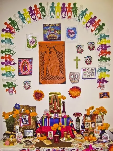 IF YOU BUILD IT, THEY WILL COME: he Mexican-American Scholarship Cultural and Recreation Association holds a Dia de los Muertos exhibition at the Santa Maria Town Center, which includes the vibrant altars built to memorialize the departed. - PHOTO COURTESY OF MASCARA