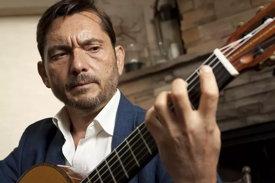 YES, HE HAS FIVE NAMES : Valencia-based classical guitarist and composer José María Gallardo del Rey and his wife, violinist Anabel Garcia del Castillo, will perform Gallardo del Rey’s original composition Glosas with the SLO Sympony at this year’s Pops by the Sea concert. - PHOTO BY STEVE E. MILLER