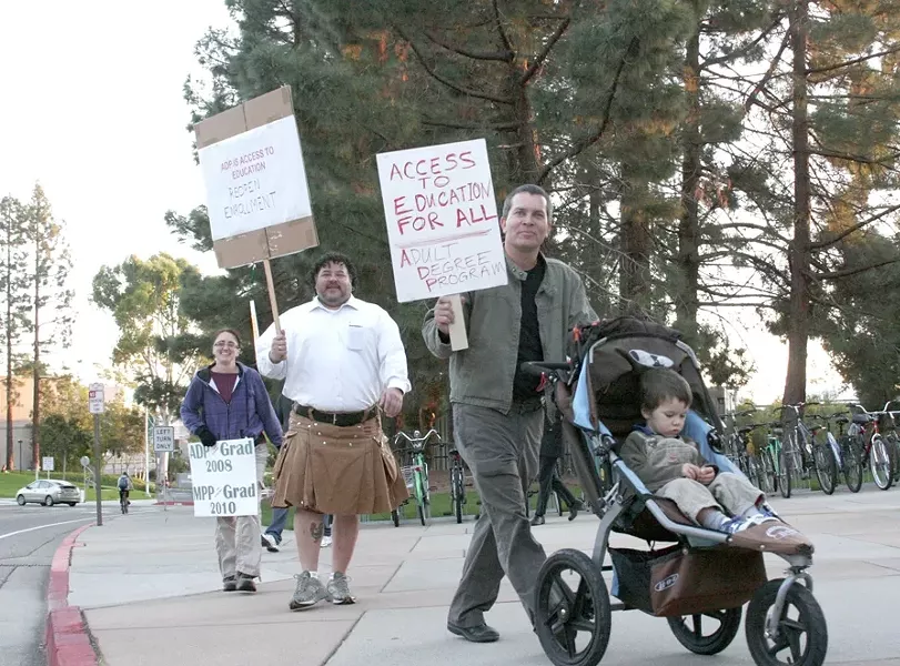 PHASED OUT? : Student protesters gathered in front of the Administration building at Cal Poly on Nov. 9 after learning the dean of Continuing Education planned to initiate a process to discontinue the Adult Degree Program. - PHOTO BY MATT FOUNTAIN
