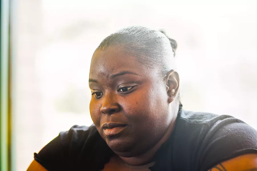 RELUCTANT TO LEAVE: With two simultaneous lawsuits against her former employer, and no prospects for local work, ex-Chipotle employee Janeka Samuels plans to move back to Pasadena. - PHOTO BY HENRY BRUINGTON