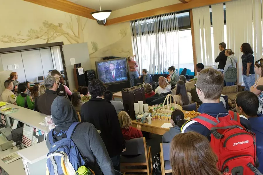 BREAKFAST WITH OBAMA : Watching pre-inauguration TV at the Cuesta student center. - PHOTO BY STEVE E. MILLER