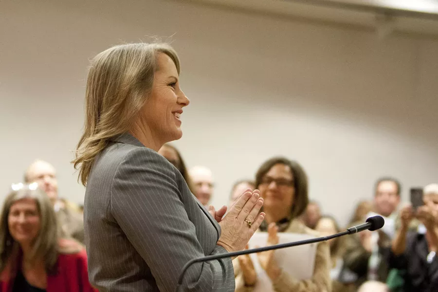 A MUCH-ANTICIPATED APPOINTMENT: Caren Ray thanked a crowded room of supporters for the standing ovation after she was sworn to her new seat as SLO County 4th District supervisor on Oct. 8. - PHOTO BY STEVE E. MILLER