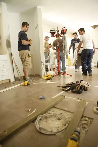 WORKING HARD : With only one day to go before the big reveal, the students in Roya Javadpour’s class still had a lot of work to do. - PHOTO BY STEVE E. MILLER