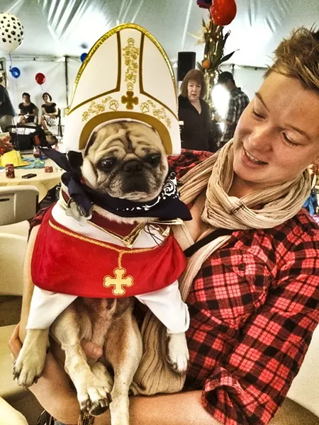 BLESS YOU!: Karl the Pope and his owner, Amy Hart, spread the good word. - PHOTO BY GLEN STARKEY