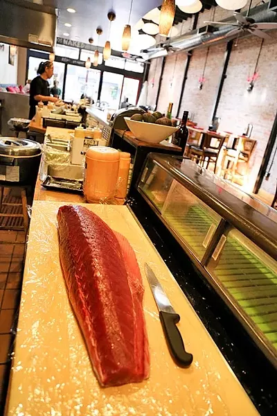 ONE FISH TWO FISH: Why not try a new fish? At Naked Fish, a rotating menu of exotic seafood brings the bounty of the sea to your belly. - PHOTO BY DYLAN HONEA-BAUMANN