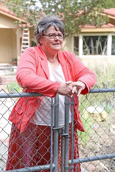 UNCONVINCED: Sue Harvey explains her concerns with the proposed water district. - PHOTO BY DYLAN HONEA-BAUMANN