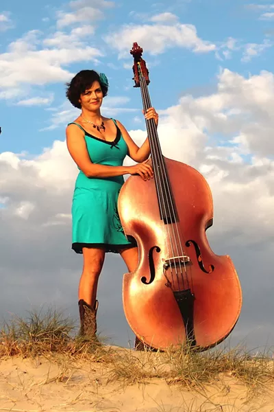 NEW MUSE: Over the years, artist and musician (bass player for Fox and Rice) Colleen Gnos has gone through phases where she’s favored politics, the ocean, and music as her muse. - PHOTO COURTESY OF COLLEEN GNOS