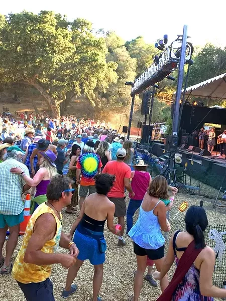 DANCERS IN THE DUST: Dancers bust out their moves to the Dustbowl Revival. - PHOTO BY GLEN STARKEY