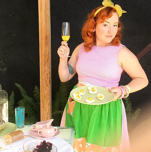 BUT FIRST, CHAMPAGNE : BUT FIRST, CHAMPAGNE A good host always has a few extra bottles of bubbly on hand. New Times Flavor writer Hayley Thomas fills the role with gusto. - PHOTO BY DR. CAIN, ESQ.