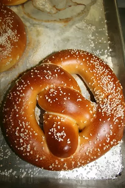 SALTY SNACK: House of Bagels Central Coast crafts its pretzels the old fashioned way with plenty of flaky salt to spare. - PHOTO BY HAYLEY THOMAS