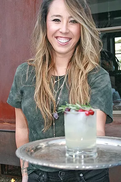 FRIENDS DON’T LET FRIENDS DRINK BLAH: Root Elixirs owner Dominique Gonzales was fed up with how intimidated her friends felt about creating their own craft creations. So, she made it super easy to DIY a sophisticated sip. - PHOTO BY HAYLEY THOMAS CAIN