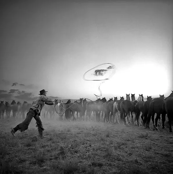 INTO THE DUST: Cowboys are going the way of the dinosaur. Good thing Wyoming photographer Adam Jahiel is snapping photos of their daily lives, teepees and lassos included. - IMAGE COURTESY OF ADAM JAHIEL
