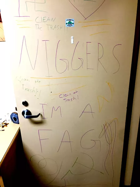 VANDALIZED: In February, a student’s Poly Canyon Village apartment door was marked up with hateful messages, the second hate-inspired crime of the school year. - PHOTO COURTESY OF MATT KLEPFER
