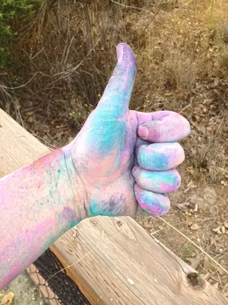 THUMBS UP: Proceeds from the Run to Know More color run went to a good cause, the Santa Barbara North County Rape Crisis and Child Protection Center. - PHOTO BY CHRIS MCGUINNESS
