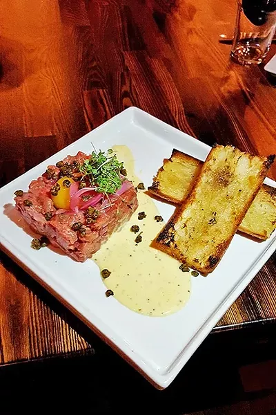 STEAK AND A DRINK: Sometimes you just want the raw deal. Go for the savory beef tartar at Mason Bar in Arroyo Grande. - PHOTO COURTESY OF MASON BAR