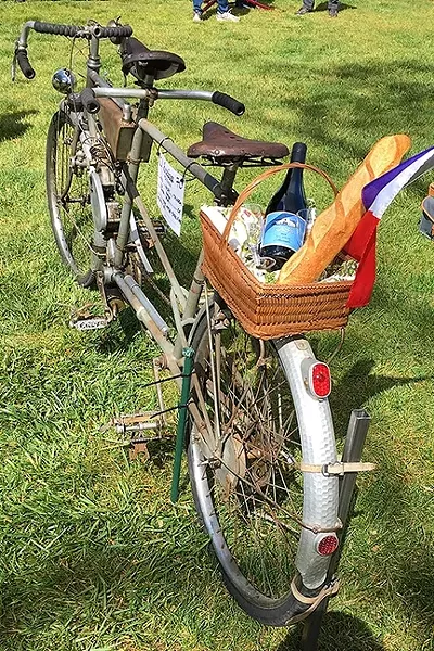 BARN FRESH: Jan Johnson of Portola Valley found this 1947 motorized Maury tandem in a barn. A pilot, Johnson flew the bike to Paso in her vintage plane. - PHOTO BY GLEN STARKEY