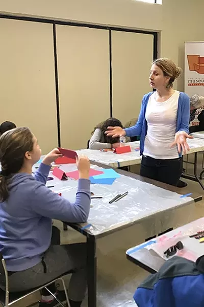 CLASS IS IN SESSION: SLO Artist Sydney Hall teaches art to students with autism for the Art on the Spectrum series at SLOMA. - PHOTO COURTESY OF TYLER SKINNER