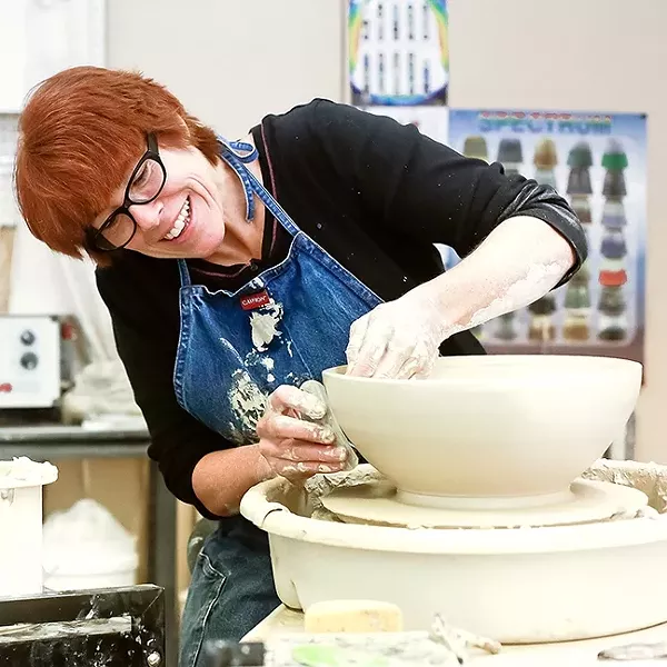ARTIST AT WORK: Ceramicist Patricia Griffin molds a bowl at her Main Street studio and shop in Cambria. - PHOTO COURTESY OF PATRICIA GRIFFIN