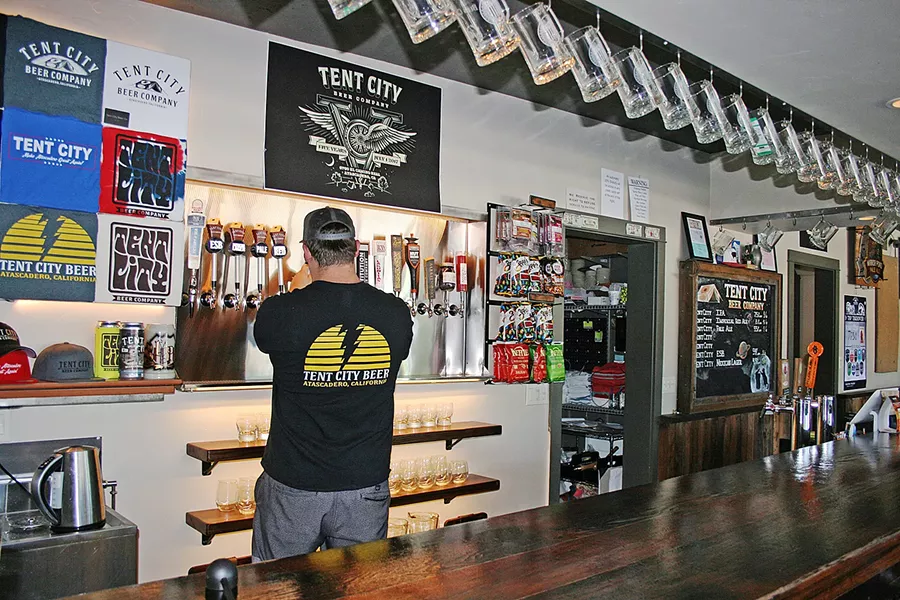 FIVE YEARS OF BEERS It's been five years plus a lot of beers, and Tent City Beer Company is upping the ante with a big anniversary bash this July 1 featuring live tunes, taco trucks, and (of course) shuffleboard. - PHOTO BY HAYLEY THOMAS CAIN