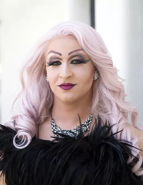 GLITZ AND GLAM The transformation from CJ Gormley to Rosé Aldé includes sparkly high heels, a bright pink wig, more than an hour of putting on makeup, and the perfect little black dress. - PHOTO BY JAYSON MELLOM