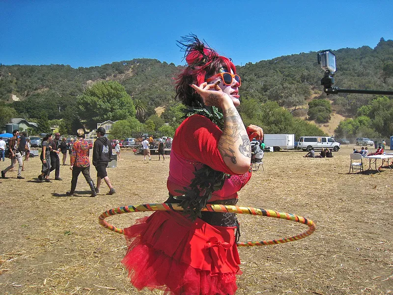 CLOWNING AROUND Clowns with Megan's Organic Market did cannabis-themed face paints for guests at the SLO Cannabis Cup. - PHOTOS BY ERICA HUDSON
