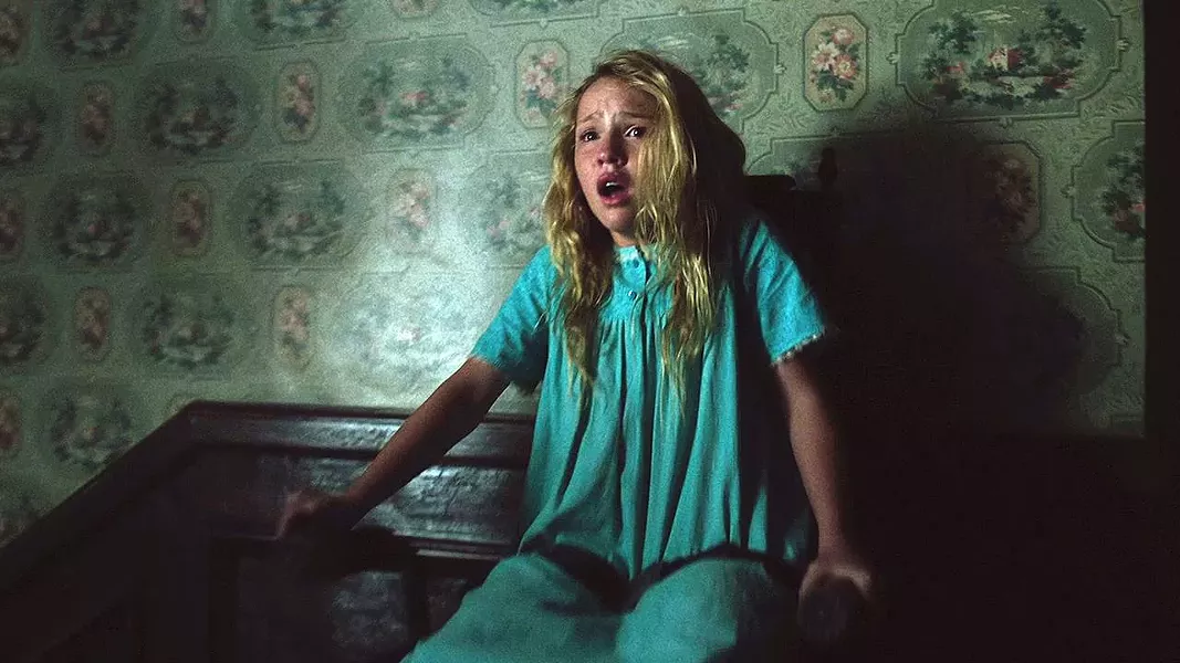 RUN! Janice (Talitha Bateman) becomes the target of a possessed doll. - PHOTO COURTESY OF NEW LINE CINEMA
