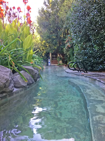 GO SOAK YOUR HEAD The Soaking Pool near Ruby's Spa offers plenty of private nooks and crannies to enjoy a private 103-degree soak. - PHOTOS BY GLEN STARKEY