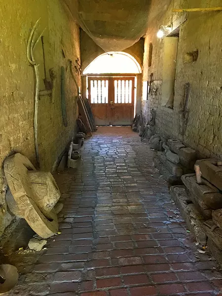 SHEEP CHUTE Mission San Miguel remains much as it was during the Wild West, like this old chute where sheep were brought in to be shorn. - PHOTO BY GLEN STARKEY
