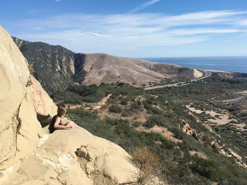 OCEAN FOR DAYS Highway 101 and the Pacific Ocean make for a pretty sweet sight from the wind caves above Gaviota State Park. - PHOTO BY CAMILLIA LANHAM