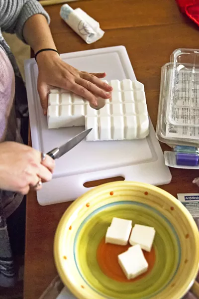 GOAT SOAP A block of goat's milk glycerine is turned into bars of soap, starting with the microwave and a bowl. - PHOTO BY JAYSON MELLOM