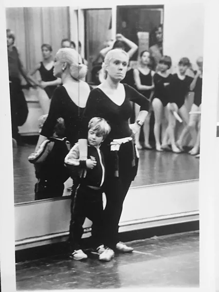 BACK IN THE DAY Lorilee Silvaggio pins down a squirming, young Drew Silvaggio while trying to teach dance class at Academy of Dance, SLO in its early days. - PHOTO COURTESY OF LORILEE SILVAGGIO