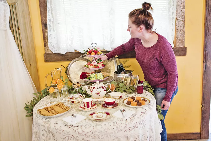DO YOU TAKE CREAM? Whitney Taylor of Cup and Carriage is a tea fanatic who will bring the tea party to you. Using locally made goodies—including scones, cookies, cakes, and more—she can customize your own tea experience. - PHOTO COURTESY OF KRISTIN RAYNOR PHOTOGRAPHY