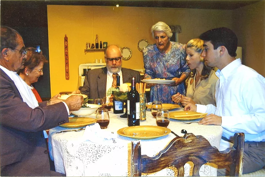 ITALIAN MOMMA Nancy Green serves dinner as the mother of a New Jersey family in the SLO Little Theatre's rendition of Over the River. - PHOTO COURTESY OF NANCY GREEN